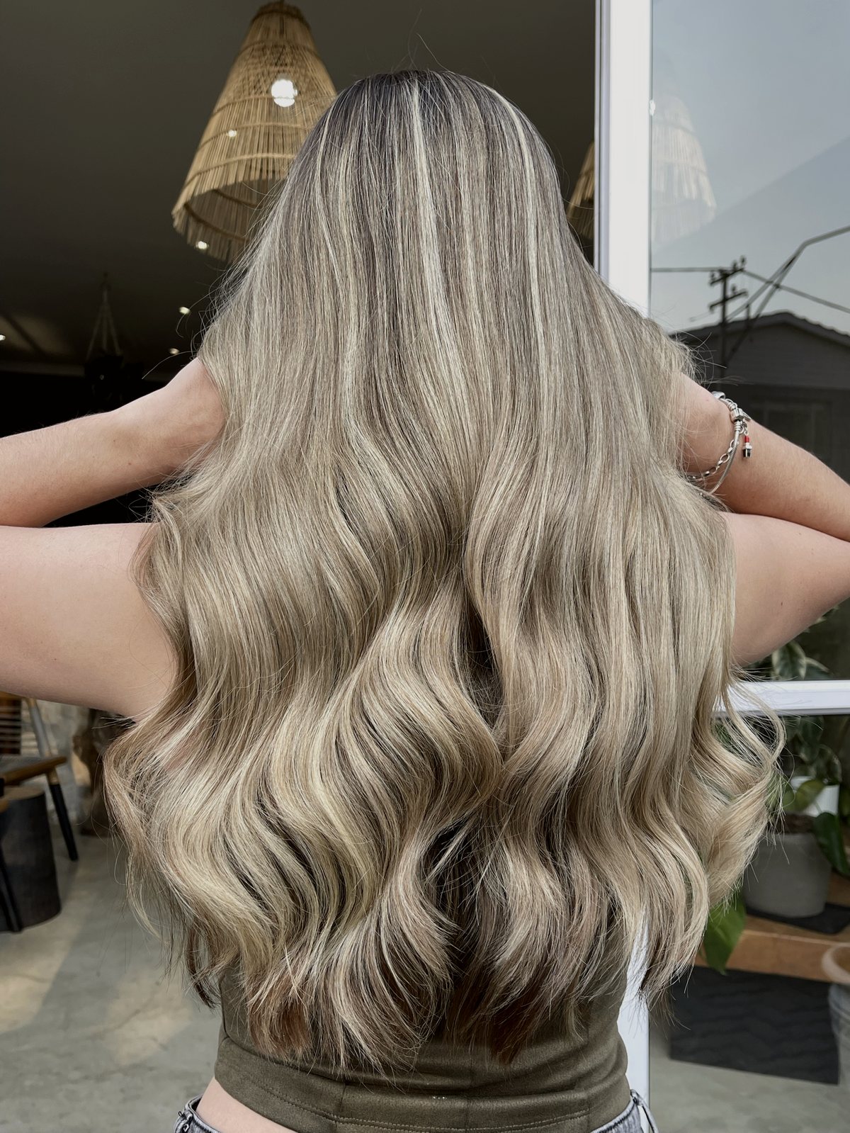 Blonde balayage waves, back view