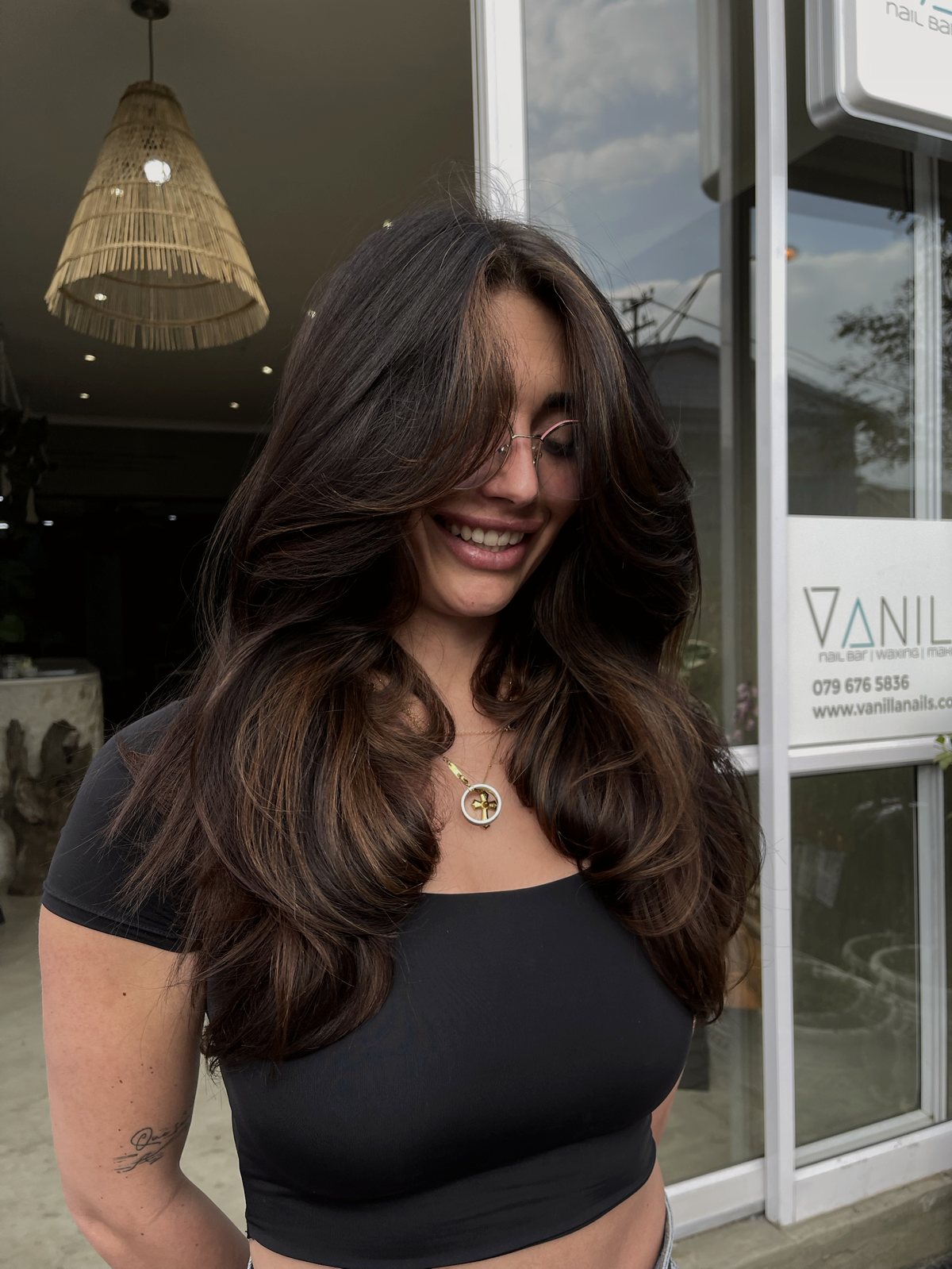 Client with dark wavy hair