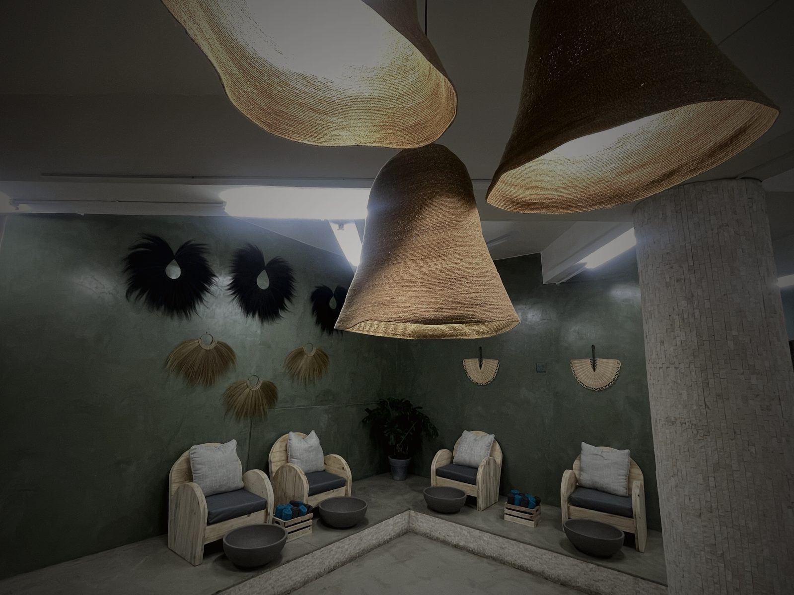 Fringed pendant lighting over the pedicure lounge